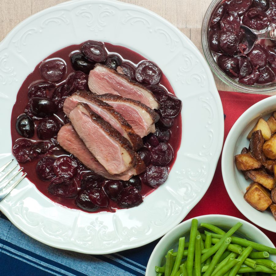 Duck with a red wine cherry sauce by Mardi Michels