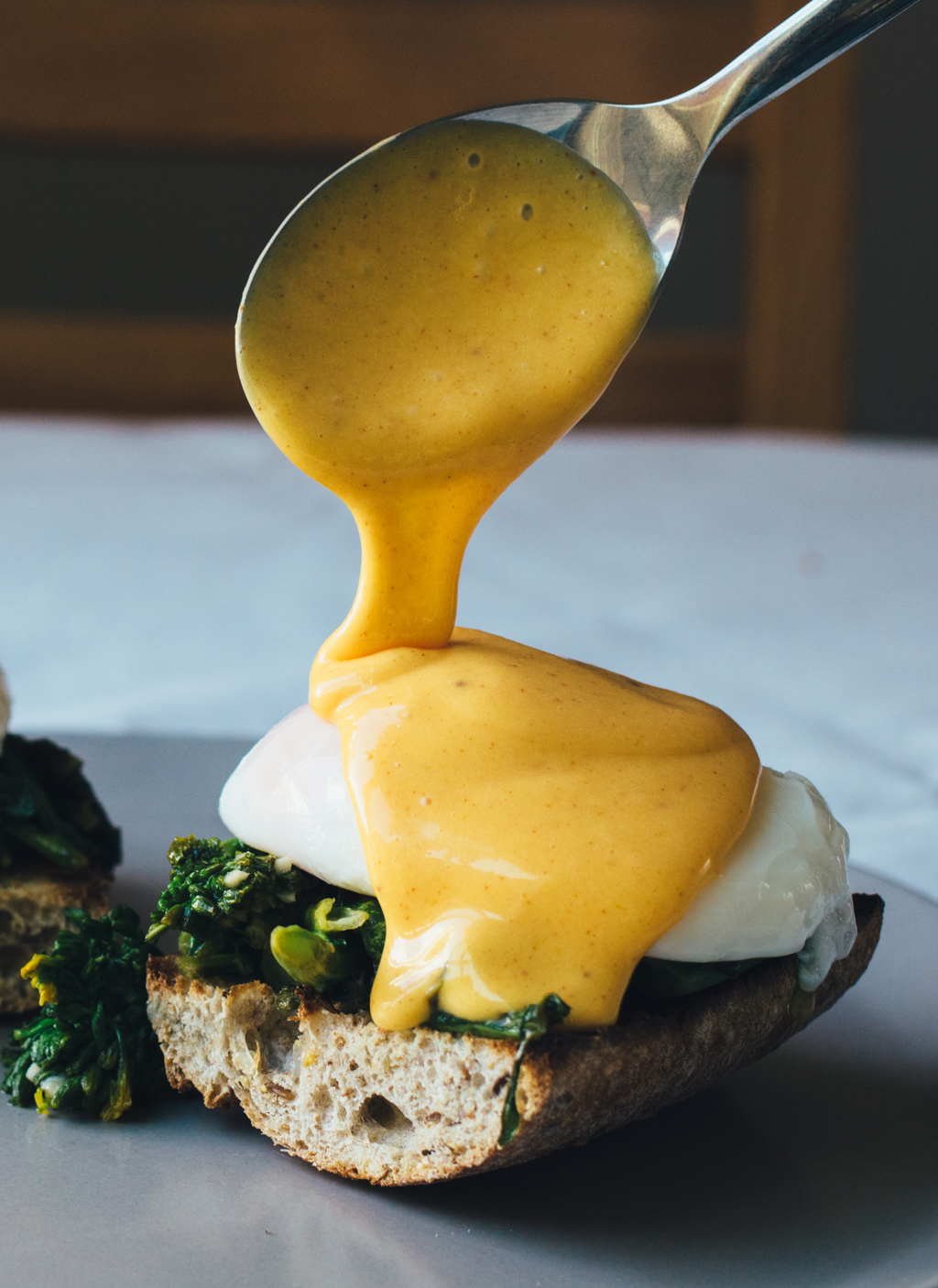 Eggs Benedict with Garlic Rapini