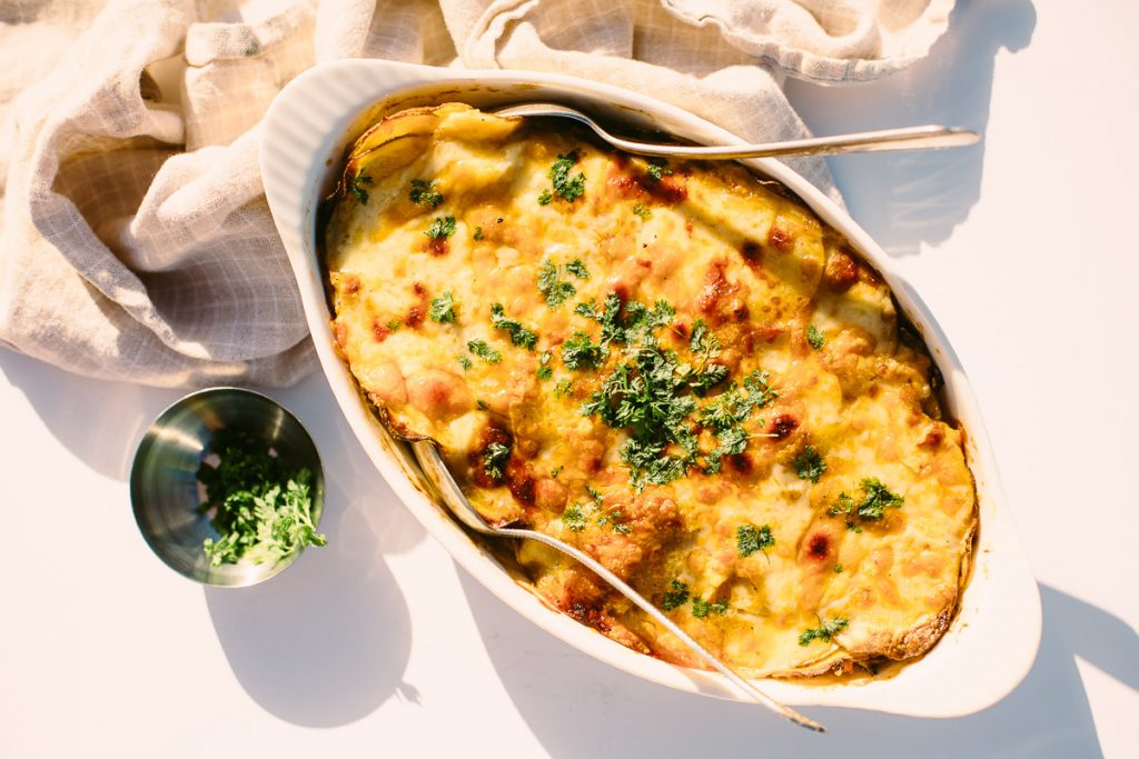 Potatoes au Gratin with Haricots Verts and Prosciutto