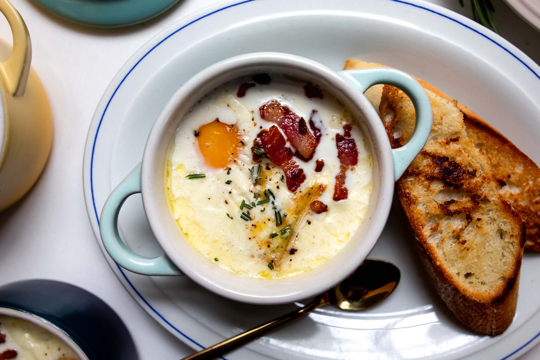 Oeufs en Cocotte with Brie, Honey & Crispy Lardons
